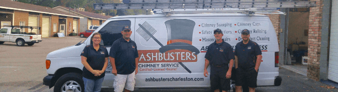 ashbusters charleston team in front of their truck.